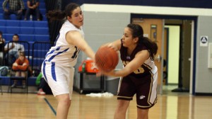 Morgan Malik blocks a pass by a Lady Hawk player in Tuesday night’s game. (Courtesy Photo)